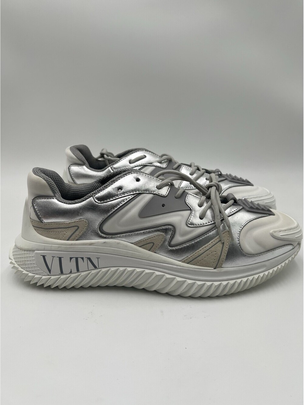 Mens Valentino Garavani VLTN Wade Runner sneakers in a silver / white Size 42